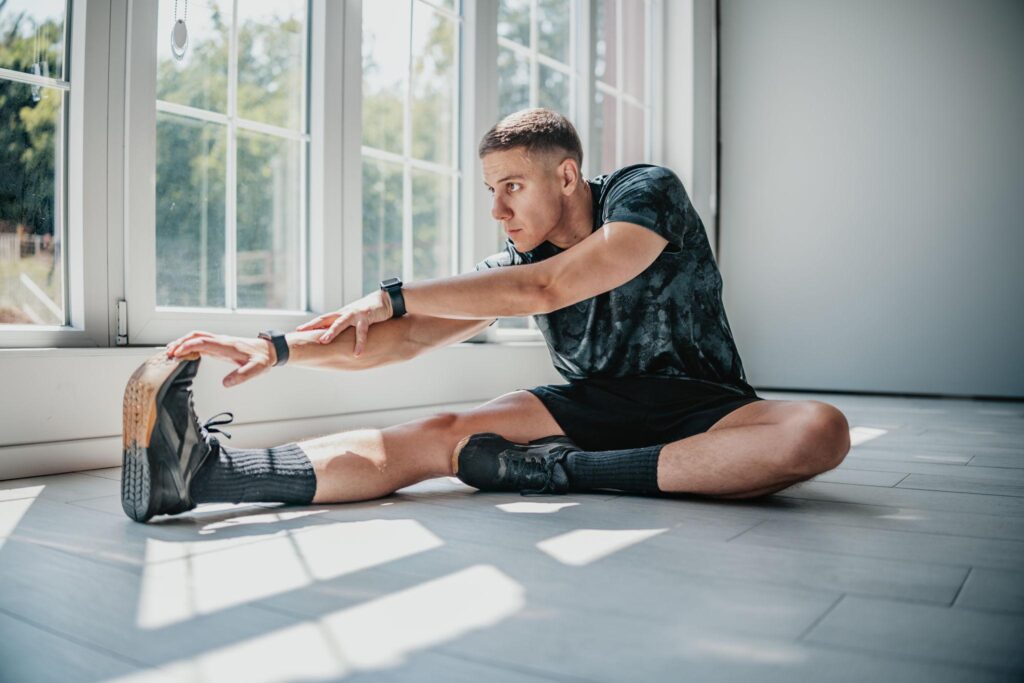 Man stretching for confidence and men wellness
